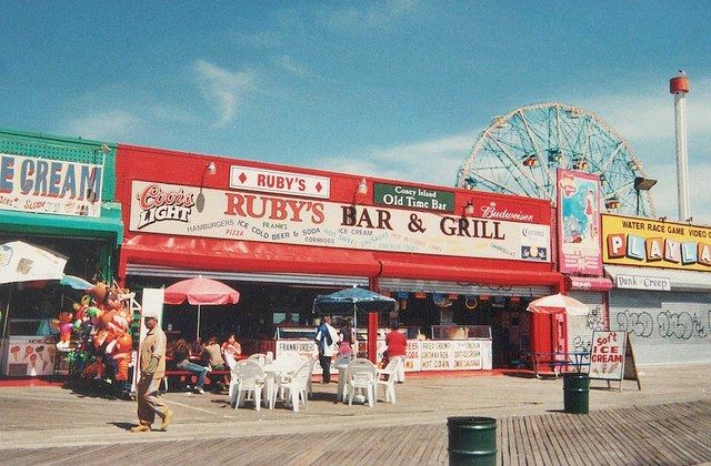 Ruby's Old Tyme Bar & GrillThings were looking pretty grim for this beloved Coney Island boardwalk dive but in the end everything worked out and we've got the old girl to kick around for another eight years. And thank goodness, cause when it comes to boardwalk drinking you really want to experience the old-school charms of Ruby's (also, it has a good jukebox). Apparently the joint has been getting a bit of a cleanupâthey just got a fancy new signâwhich is kind of a shame. The fact you might fall through the floor on the way to the bathroom  was always one of the place's charms.1213 Riegelmanns Boardwalk // 7148-975-7829